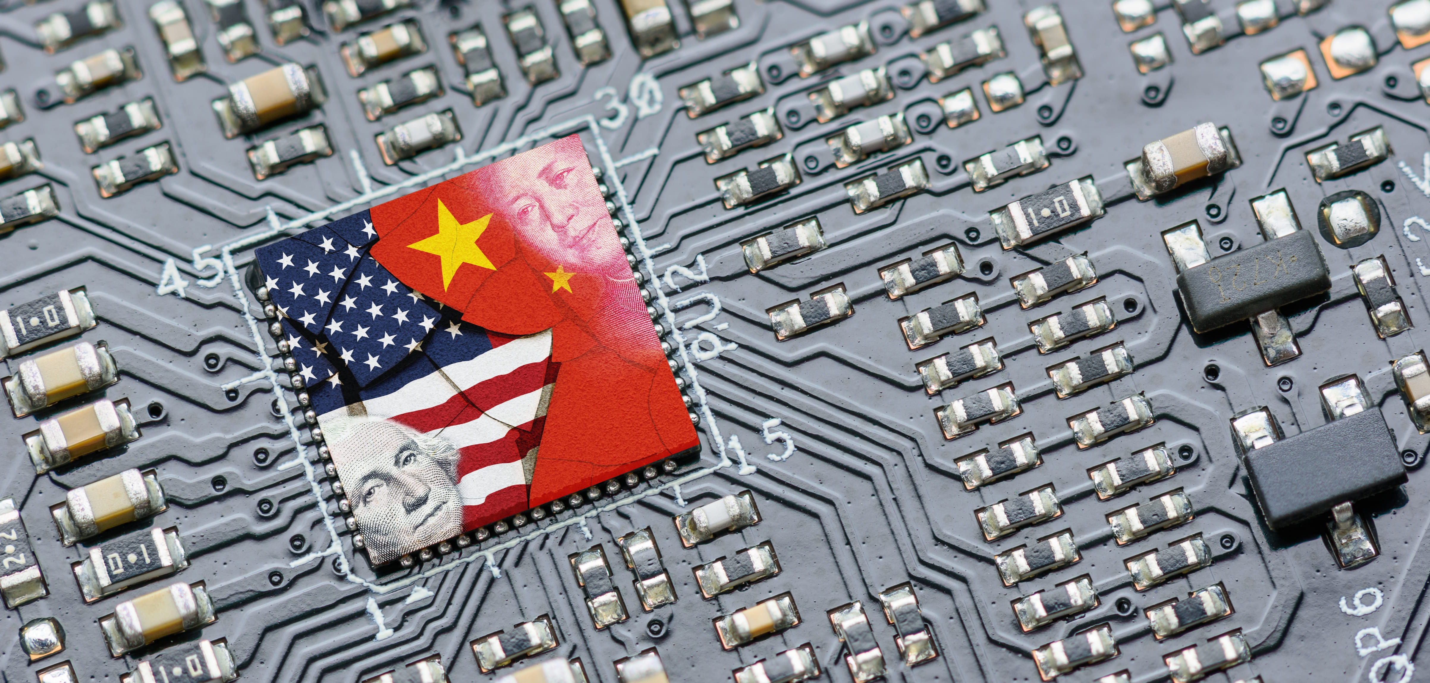 Flag of USA and China on a processor, CPU or GPU microchip on a motherboard. US companies have become the latest collateral damage in US - China tech war