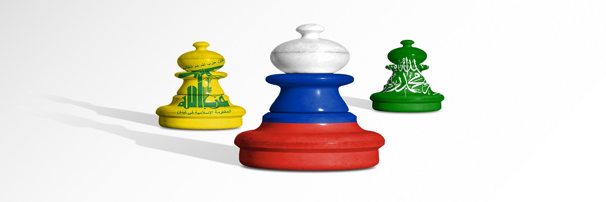 Emblems of Russian and Hezbollah's army depicted on the chess pieces