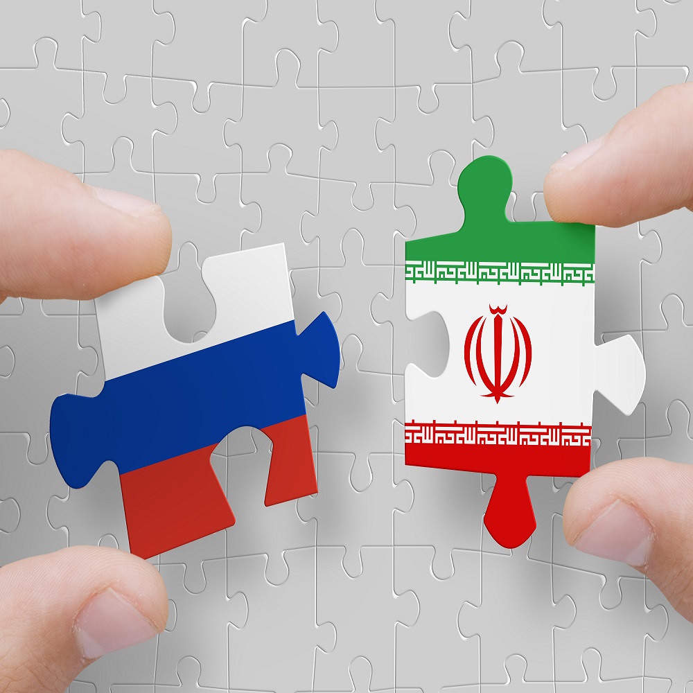 Russian and Iranian flags on matching puzzle pieces 