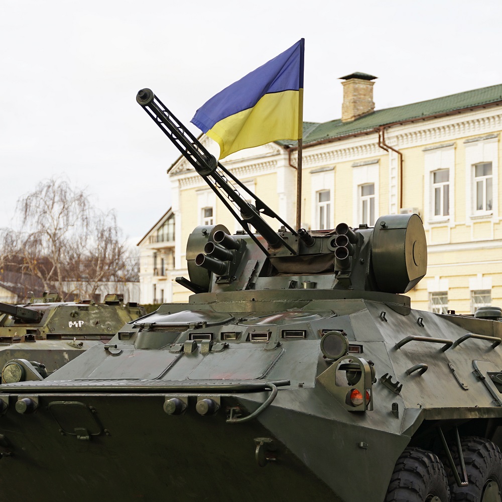 Troop carrier and tank with Ukrainian flag, Ukraine
