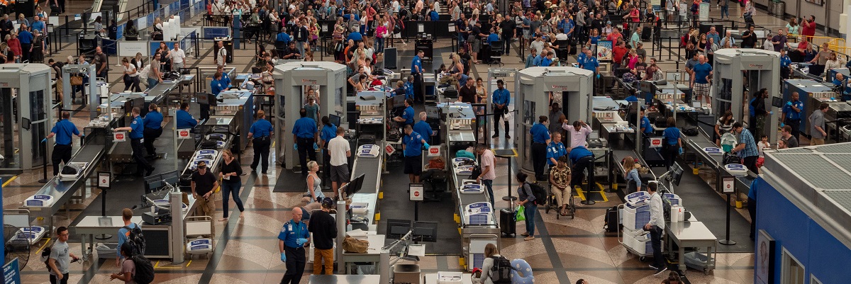 Denver, CO July 7, 2018: Large line of travelers backed up at security checkpoint at Denver International Airport