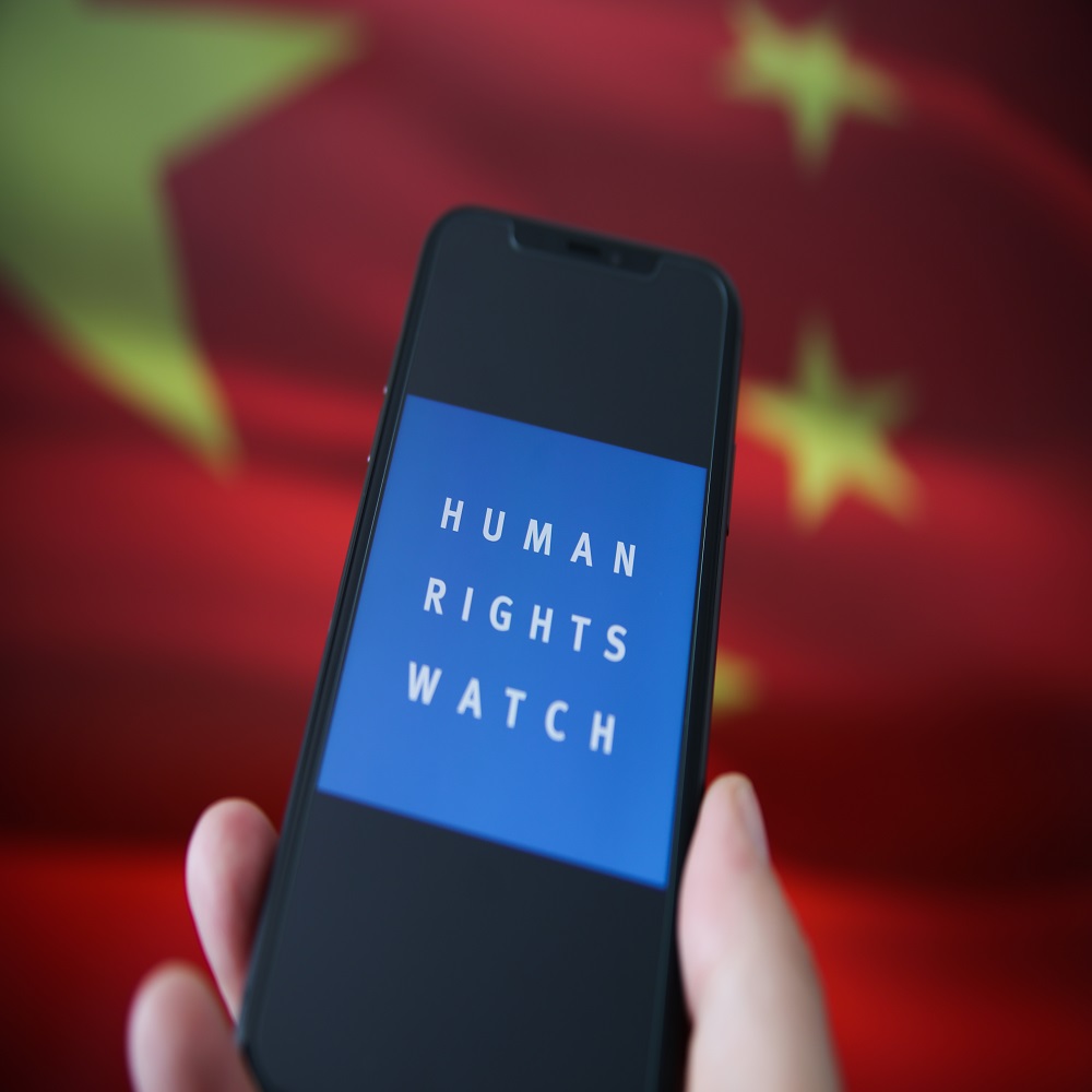 Blurred chinese flag background.(Focus on human)