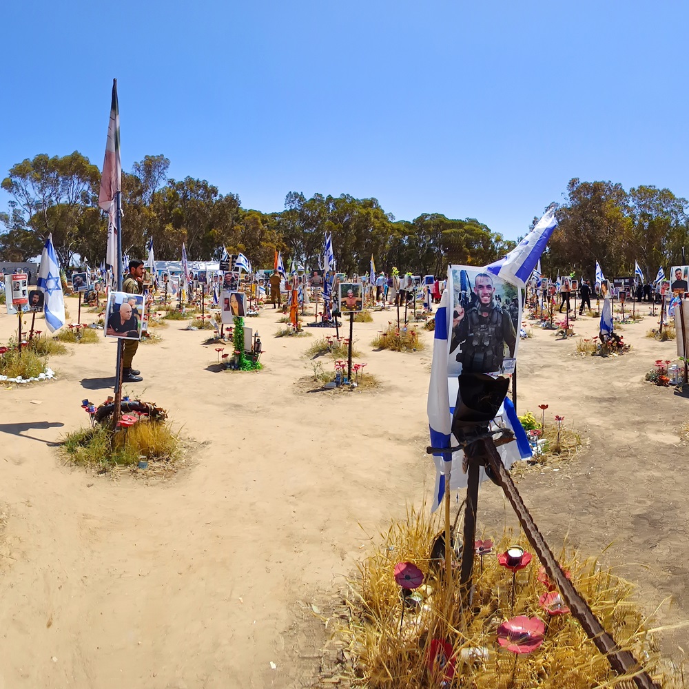 RE'IM, ISRAEL - April 17, 2024: Memorial composed of photos of young Israelis killed during the terrorist attack on the NOVA Festival which took place on October 7, 2023 a few kilometers from Gaza