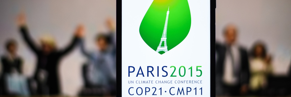 Selective focus of the 2015 United Nations Climate Change Conference, COP 21 or CMP 11 logo on a mobile screen stock image: Dhaka, BD- Feb 27, 2024