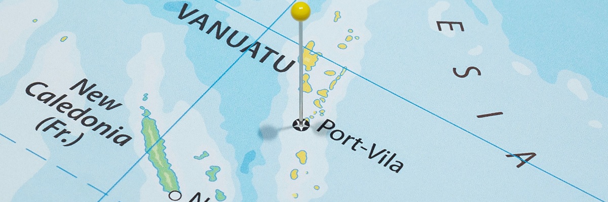 Close up to a Port Vila city with a yellow pin needle into Vanuatu country political map 