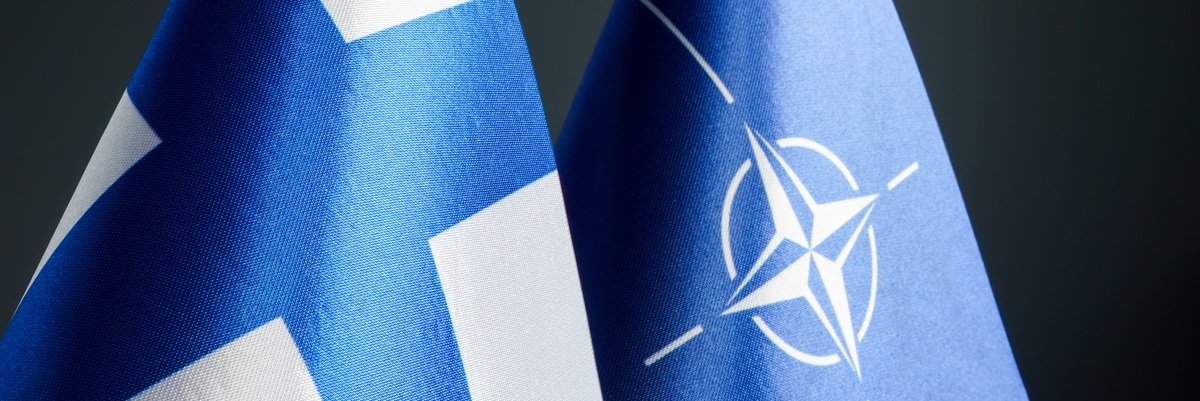 KYIV, UKRAINE - May 1, 2022. Flags of Finland and NATO.