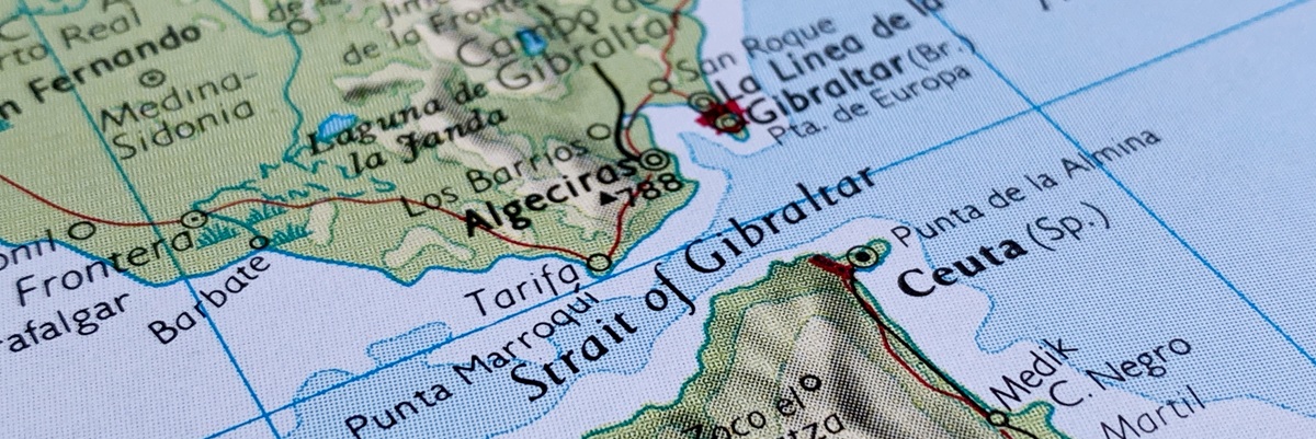 Strait of Gibraltar, Spain, Morocco, a photo of an atlas map, suitable to illustrate travel. tourism, trade and politics topics