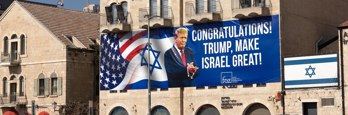 Jerusalem, Israel-November 8, 2024. Banner with photo of Donald Trump congratulating on victory in US presidential election hangs on a building in Jerusalem