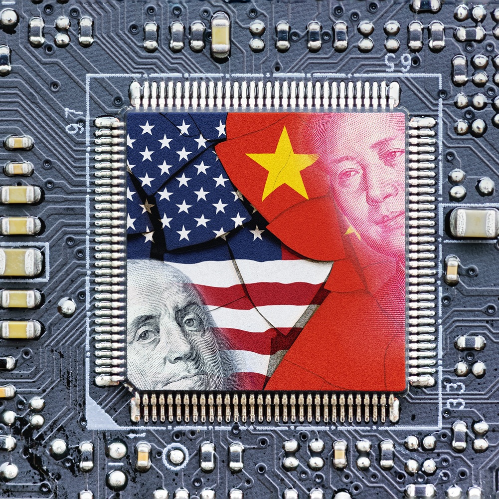 Flag of USA and China on a processor, CPU or GPU microchip on a motherboard. US companies have become the latest collateral damage in US - China tech war. US limits, restricts AI chips sales to China.
