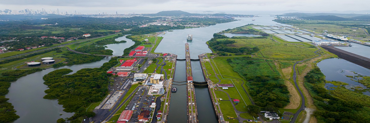 Aerial view Panama Canal, third set of locks, water shortages, maritime traffic, water reuse vats, summer drought.