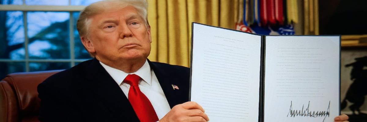 WASHINGTON, DC - JANUARY 20: President Donald Trump signs executive orders in the Oval Office of the White House on January 20, 2025 in Washington, DC. Trump takes office for his second term as the 47