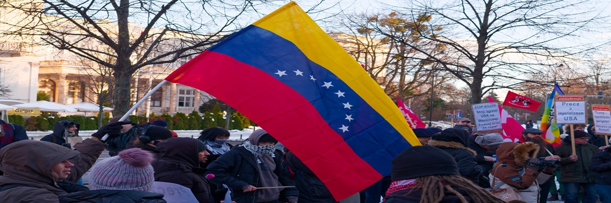 Warsaw, Poland - January 04 2026: Venezuelan flag waved during protest against U.S. intervention in Venezuela.